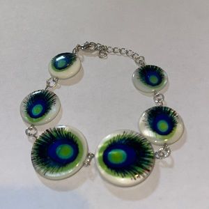 Adjustable peacock bead bracelet